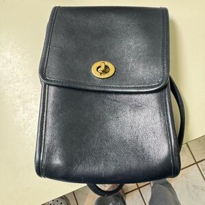 Black Leather Crossbody Bag with Gold Accentuated. Authentic vintage coach.